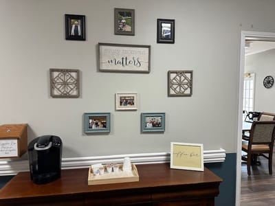 Interior common area with wall decor and coffee station