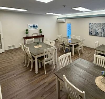 Bright common area with tables and chairs