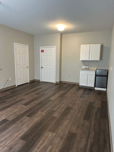 Interior of a private resident room with kitchenette