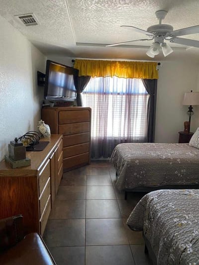 Interior view of a resident room with two beds