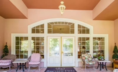 Entrance of Bayview Villa with outdoor seating