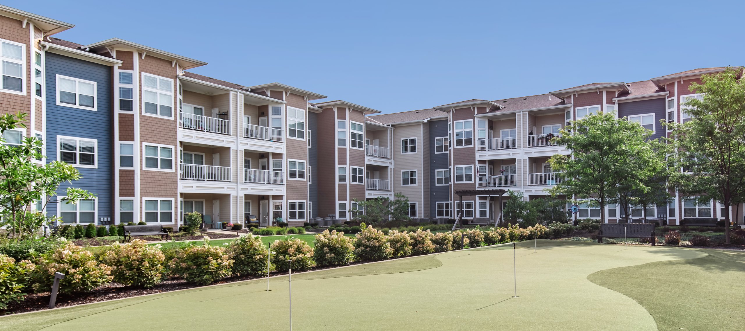 Exterior view of residential buildings with landscaping
