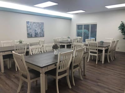 Interior view of a common area with tables and chairs