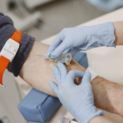Riverside Manor, nursing home in Ames, IA — Blood draw procedure on a patient’s arm
