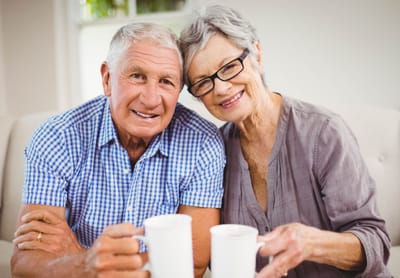 Riverside Manor, nursing home in Ames, IA — Happy senior couple enjoying coffee together