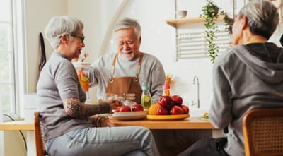 Riverside Manor, nursing home in Ames, IA — Seniors enjoying a meal in a bright kitchen setting