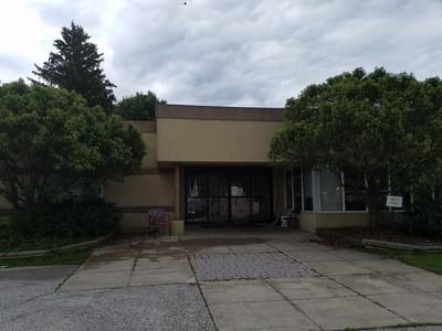 Entrance of a care facility with landscaped front