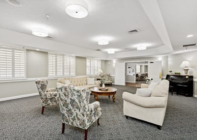 Common area with seating in a warm interior setting