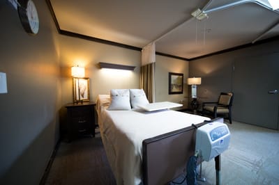 A well-furnished private resident room with amenities