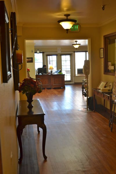 Interior hallway with natural lighting and decorative elements