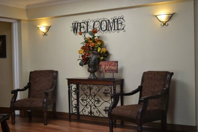 Welcoming interior with seating and flowers