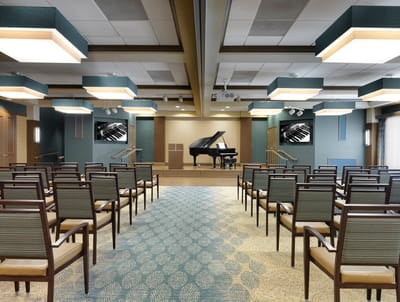 Interior view of a community activity room with seating
