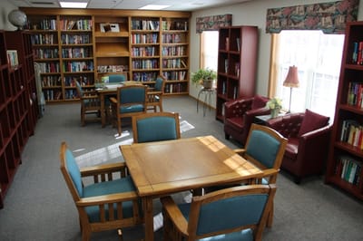 Interior view of a cozy library space with bookshelves