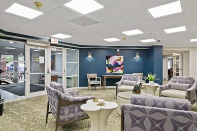 Bright lounge area with seating and decor