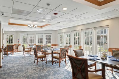 Bright dining room with tables and chairs
