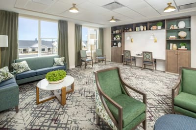 Bright common area with comfortable seating and natural light