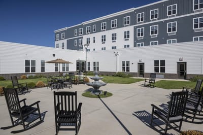 Outdoor courtyard area with seating and fountain