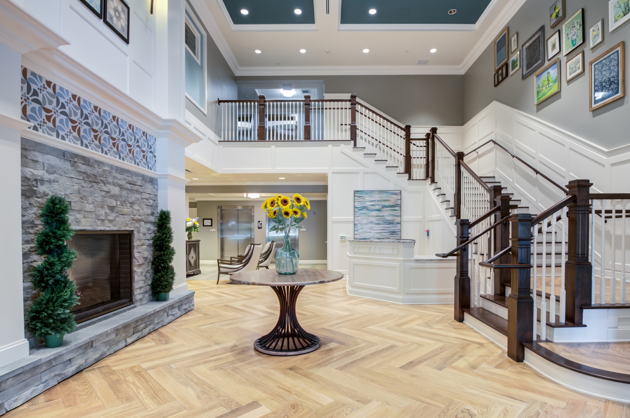 Bright and welcoming lobby area with stairs and seating