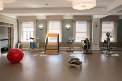 Interior view of a fitness area with exercise equipment