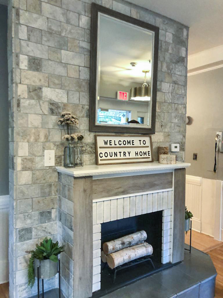 Welcoming interior space with a fireplace and signage