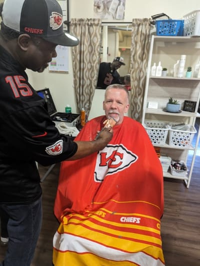 Resident getting a haircut at the salon