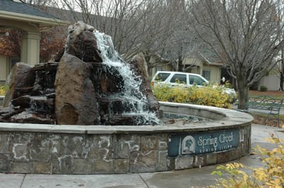 Outdoor fountain in front of senior living facility