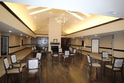 Spacious common area with chairs arranged for activities