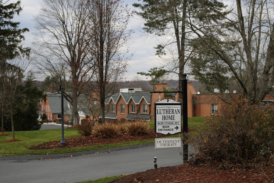 Main entrance sign of Lutheran Home with exterior view