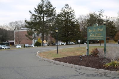 Entrance sign for River Glen Health Care Center