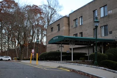 Entrance of Woodview Elderly Housing with awning