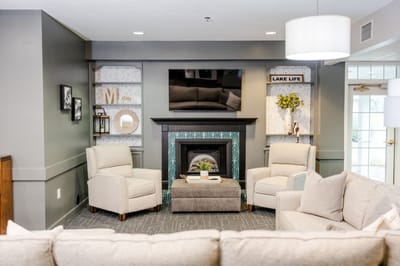 Comfortable lounge area with armchairs and a fireplace
