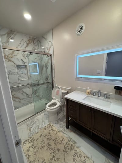 Modern bathroom with glass shower and vanity
