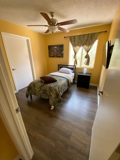 Cozy bedroom with a single bed and window