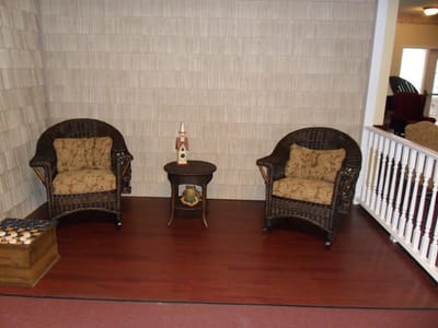 Cozy seating area with two wicker chairs