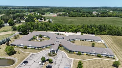 Aerial view of Heritage Senior Living facility and surrounding landscape