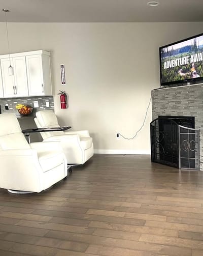 Bright common area with comfortable seating and entertainment