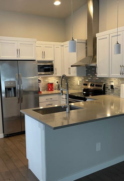 Modern kitchen with stainless steel appliances