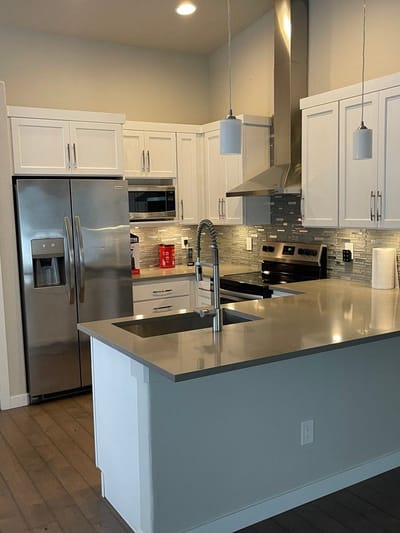 Modern kitchen layout with stainless steel appliances