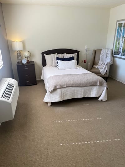 Cozy private resident room with light decor