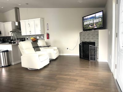 Modern common area with comfortable seating and a TV