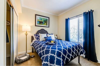 Cozy resident room with a bed and decorative elements