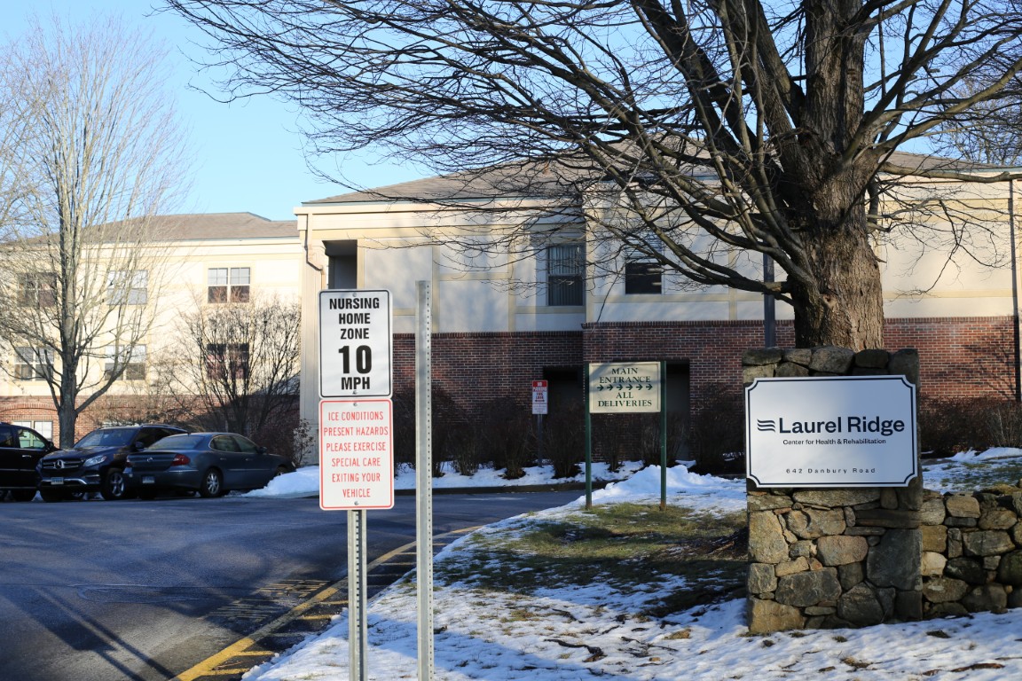 Outdoor view of Laurel Ridge Health Care Center sign and building