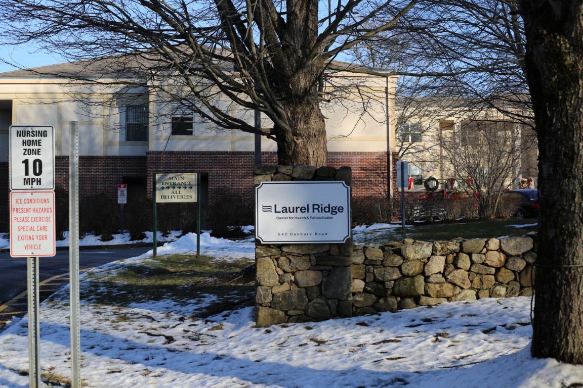 Exterior view of Laurel Ridge Health Care Center with signage