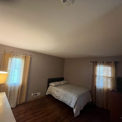 Simple bedroom with a bed and window