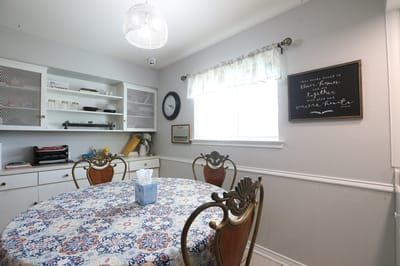 A well-set dining table in a common area