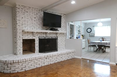 Interior view of a cozy living room with a fireplace