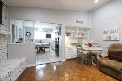 Cozy common area in a nursing home with seating and decor