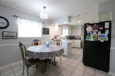 Bright kitchen area with a dining table and decor