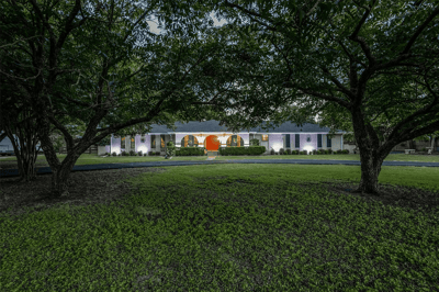 Facade of Gardenia Living surrounded by trees