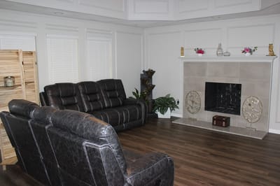 Cozy living room area with a fireplace and seating